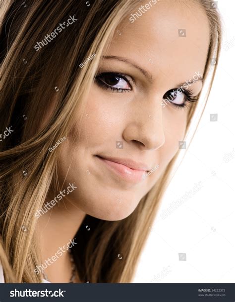 Closeup Portrait Of Beautiful Smiling College Girl Looking At Camera Isolated On White