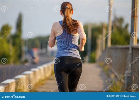 Back View Of Jogging Young Woman On The Bridge Stock Image Image Of