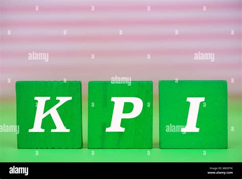 Kpi Word Written In Green Wooden Blocks Key Performance Indicator