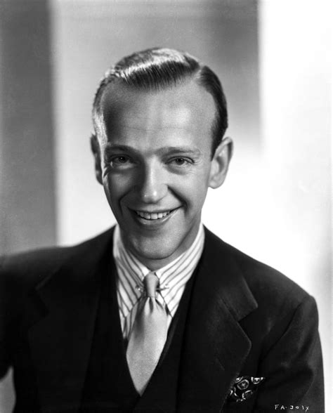 Fred Astaire Smiling In Formal Attire With Gray Background Photo Print