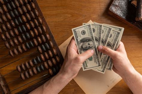 Premium Photo Male Hands Counting Us Dollar Bills Or Paying In Cash