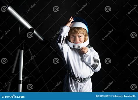 Adorable Cute Boy Astronaut In Outer Space Child Imagines Himself To