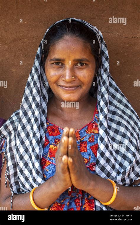 Adivasi Woman Joining Hands In A Village In Narmada District Gujarat