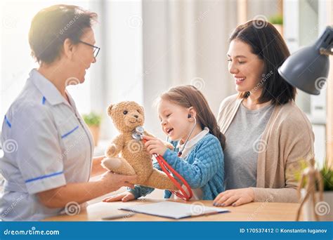 Child At A Doctor`s Appointment Stock Photo Image Of Doctor Care