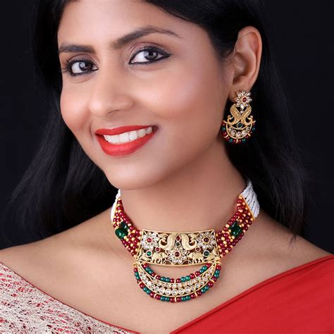 Buy Panash Gold Plated Green Red Kundan Studded Pearl Beaded Jewellery