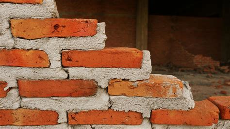 Close-up of the rubble of an industrial building collapsing into a pile