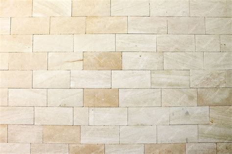 Premium Photo Seamless Beige Marble Stone Tiles Texture With White