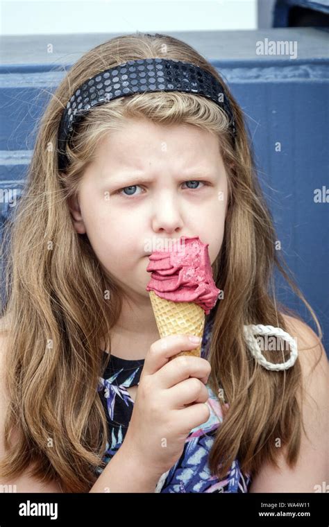 Girl Eating Ice Cream Stock Photo Alamy