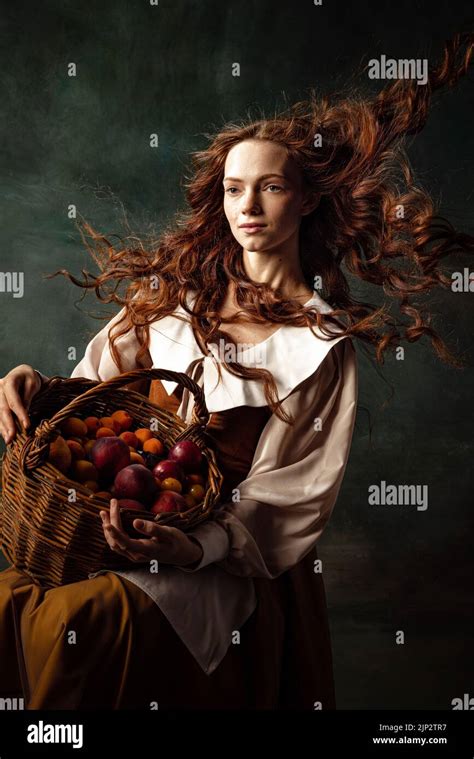 Portrait Of Charming Redhair Girl With Long Curly Hair Like Girl Of