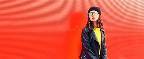 Portrait Of Stylish Woman Model Posing Wearing Black Rock Style Leather Jacket Hat Eyeglasses