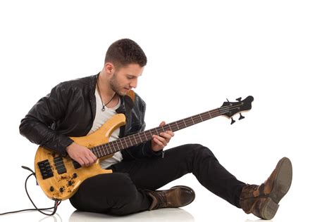 How To Hold A Bass Guitar Learn To Play Music