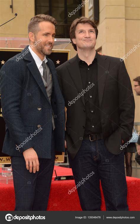 Nathan Fillion With Ryan Reynolds Stock Editorial Photo © Sbukley