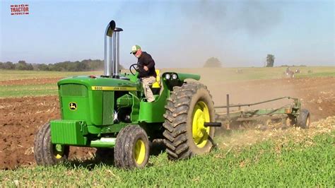 John Deere Tractor Plowing Field