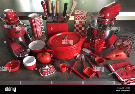 many red design kitchen utensils Stock Photo - Alamy