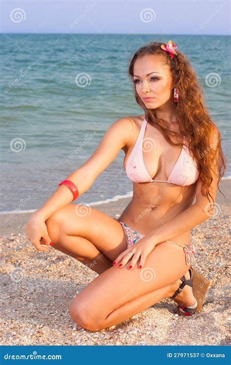 Beautiful Woman Sitting In Bikini Stock Image Image Of Water