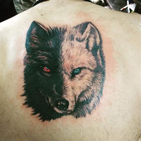 Black And White Wolf Tattoo Ideas An easy black and gray shaded small wolf tattoo on the forearm ...