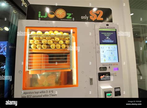 Fresh Orange Squeeze Juice Vending Machine In Singapore Stock Photo Alamy