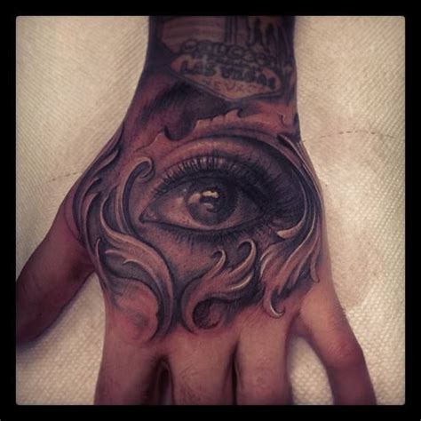 Eye detailing on back of hand. niiiice! Tattoo by Carl Grace | Egyptian ...