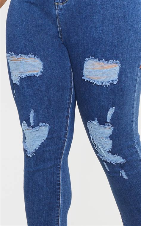 Plt Plus Mid Blue Ripped Disco Jeans Prettylittlething