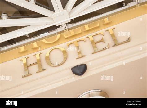 Hotel Sign on Building Entrance Stock Photo - Alamy