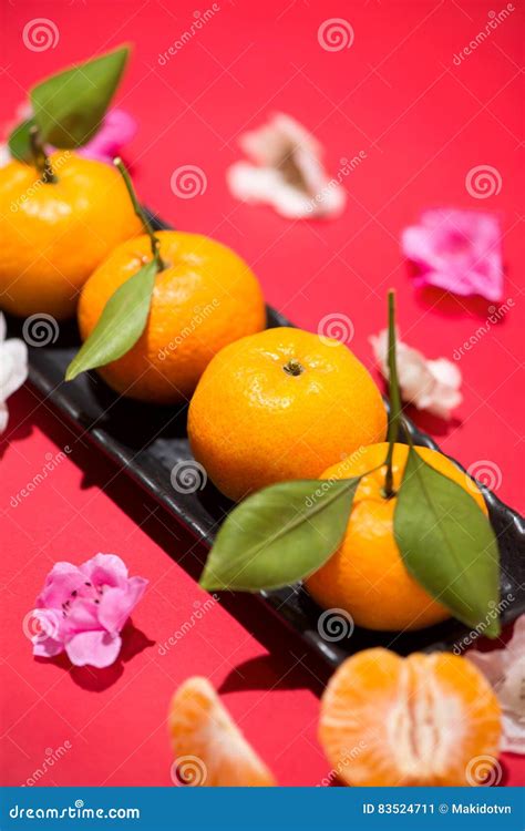 Chinese New Year`s Decoration Mandarin Orange On Red Background Stock