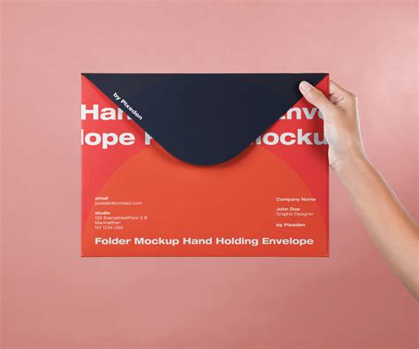 Hand Holding Large Envelope Free Mockup Free Mockup World