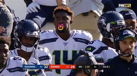 Childs Play Nfl Star Dk Metcalf Wears Pacifier Mouthguard In