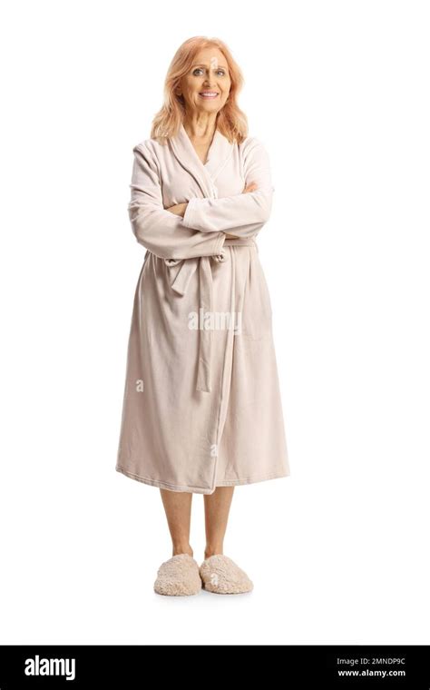 Full Length Portrait Of A Mature Woman In A Bathrobe Posing And Smiling