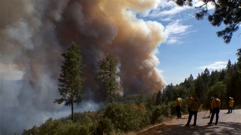 Dozens Of Buildings Burn As Gusty Winds Fan California Wildfire