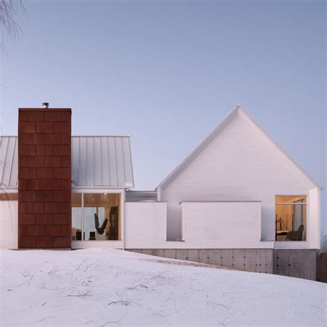 Weathered Steel Fins Surround Corten House By Dmoa Architecten