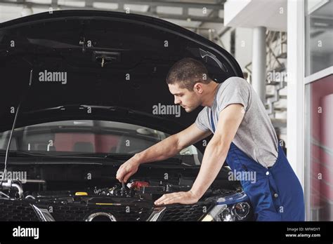 Auto Mechanic Working In Garage Repair Service Stock Photo Alamy