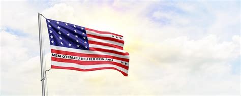 Premium Photo Bikini Atoll Flag Waving On Sky Background D Rendering