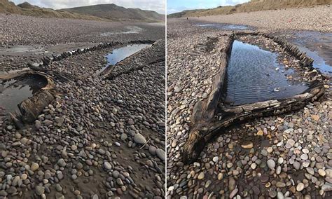 Shipwreck Emerges From Beneath Sands On South Wales Beach After It Was