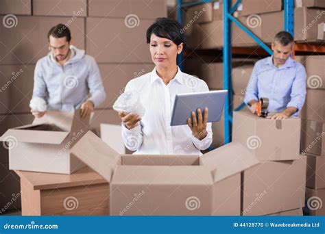 Warehouse Workers Packing Up Boxes Stock Photo Image 44128770