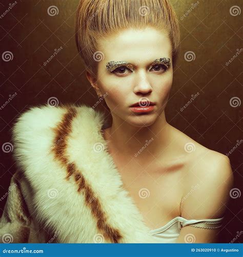 Venus In Furs Concept Portrait Of Fashionable Red Haired Model With Perfect Arty Make Up