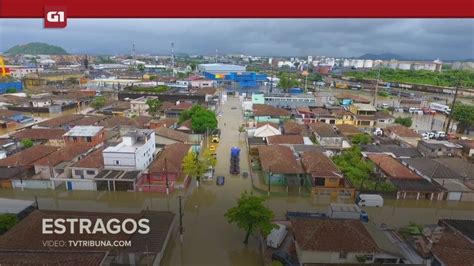 Vídeo G1 em 1 Minuto Santos Temporal causa alagamentos e provoca