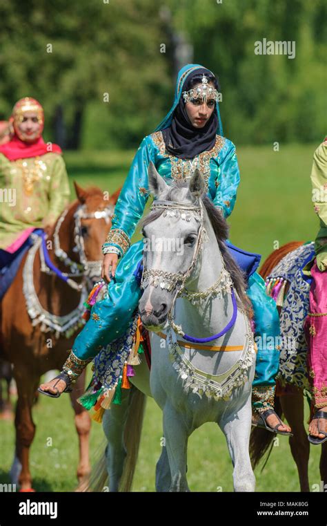 Members Of The Arab Show Group Royal Cavalry Of Oman Ride In