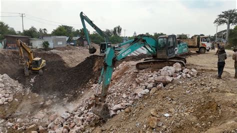 Rehabilitation Of Canals Using Many Machines Excavator Caterpillar