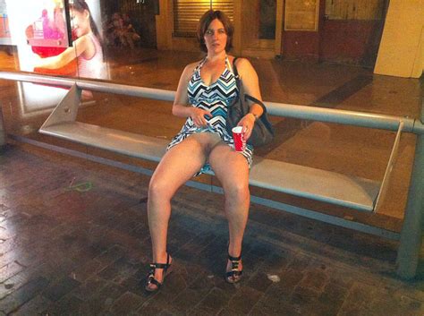 Almost Nude Mature Lady In Body Paint And Mask Displaying Her Big Boobs