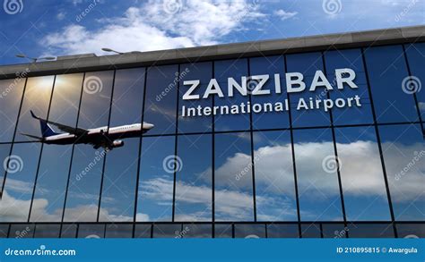 Airplane Landing at Zanzibar Tanzania Airport Mirrored in Terminal ...