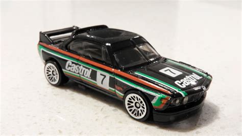 Машинка Базова Hot Wheels BMW CSL Race Car Speed Graphics DTX Black купити в
