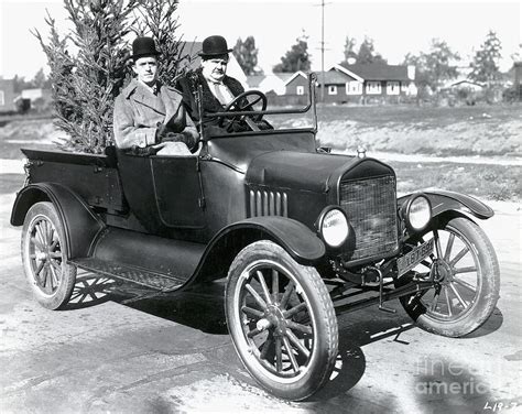 Laurel And Hardy In A Model T Ford By Bettmann