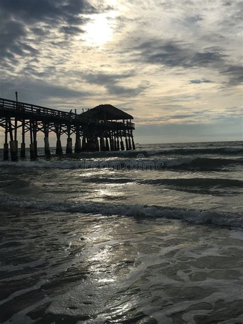 The Cocoa Beach Pier On A Cloudy Day Stock Photo Image Of Begins