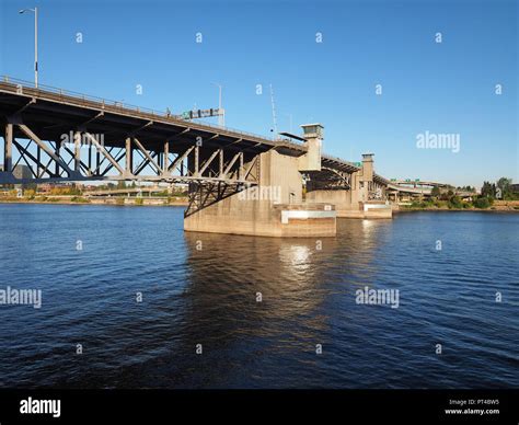 Portland Oregons Morrison Bridge Over The Willamette River On A Clear