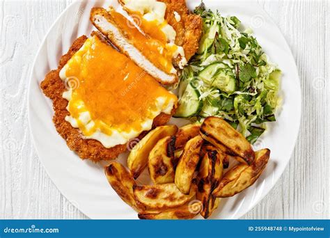 Chicken Parmo with Coleslaw and Roast Potatoes Stock Photo - Image of ...