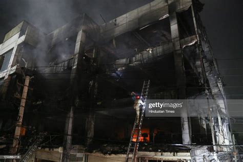 A View Of The Charred Site After A Massive Fire Broke Out Inside A