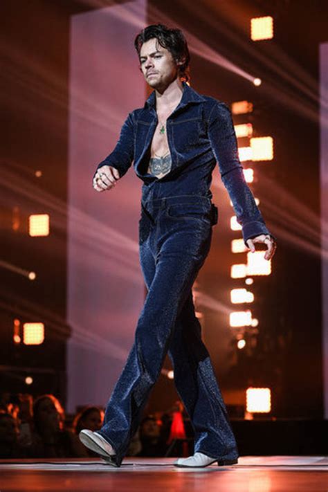 An Ode To Harry Styles Iconic Denim Two Piece From His Jingle Bell