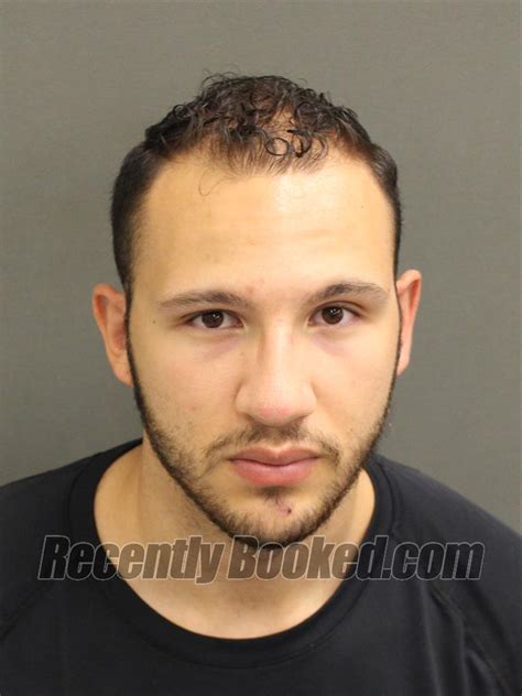 Recent Booking Mugshot For Christian Alexander Lazala In Orange