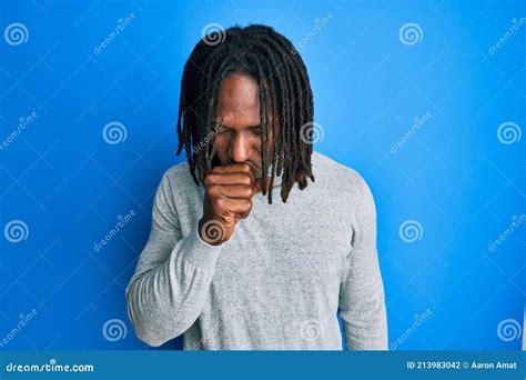 African American Man With Braids Wearing Turtleneck Sweater Feeling