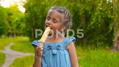 Girl Sucking Popsicle